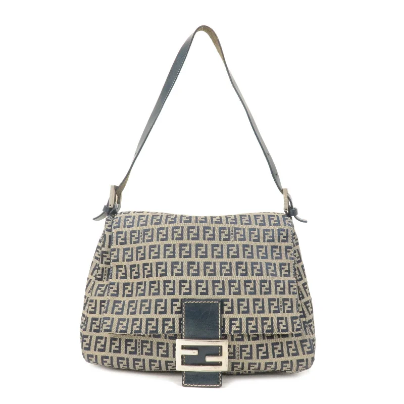 Fendi crossbody bags with a faux fur trim for a warm and stylish winter accessoryFENDI Mamma Baguette Zucchino Canvas Leather Shoulder Bag 26325