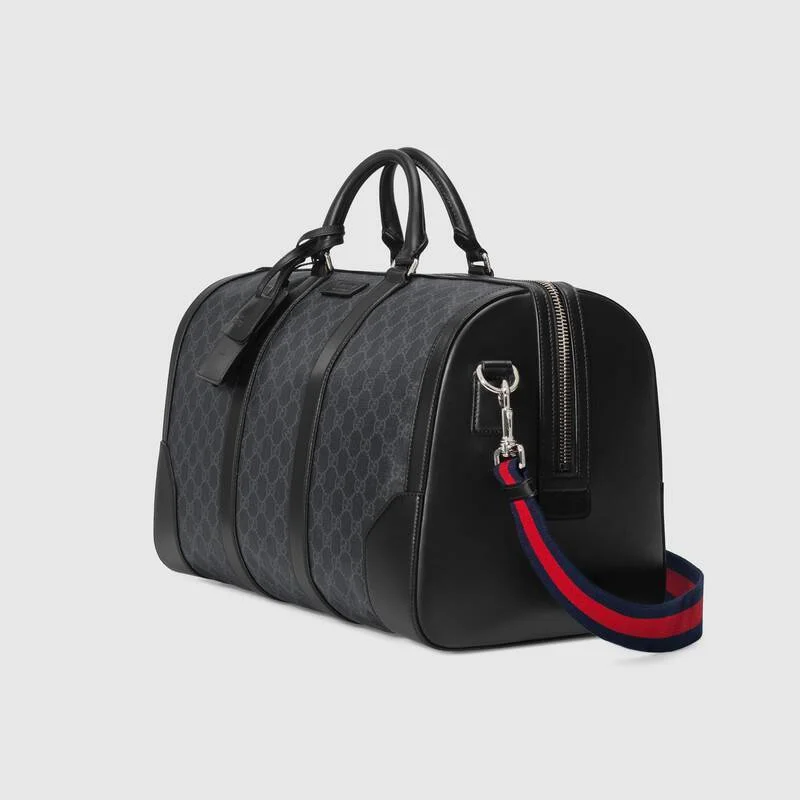 Gucci handbags for women with a patent - leather finishGUCCI GG LOGO COATED CAVAS DUFFLE BAG