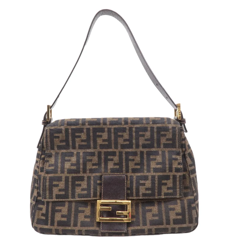 Ladies Fendi shoulder bags with a quilted leather exterior for a luxurious and cozy lookFENDI Mamma Baguette Zucca Canvas Leather Shoulder Bag Brown