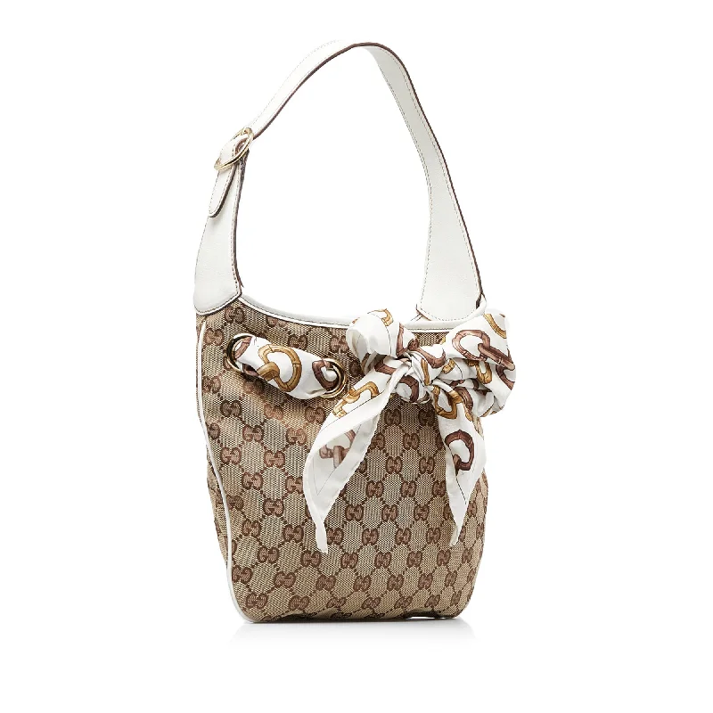 Ladies Gucci Dionysus bags with a star - shaped charmGucci GG Canvas Positano Hobo Hobo Bag