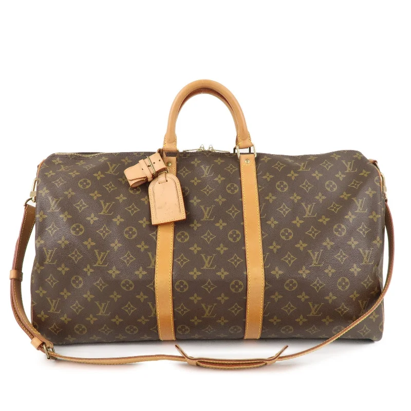 Louis Vuitton Alma bags featuring the signature top - handle designLouis Vuitton Keep All Bandouliere 55 Boston Bag & Strap M41414