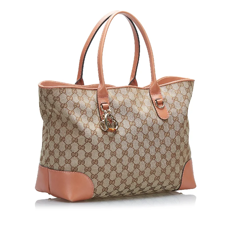 Women Gucci backpacks with a luxurious leather finishGucci GG Canvas Heart Bit Tote (SHG-3fnCTw)