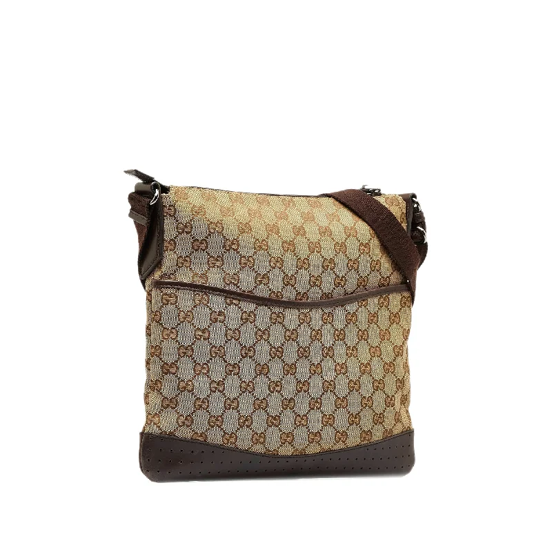 Women Gucci bags with a snap - button closure and a decorative charmGucci GG Canvas Crossbody Crossbody Bag