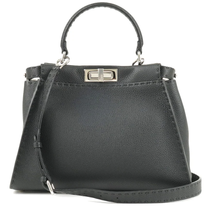 Ladies Fendi Peekaboo bags with a hand - carved leather detail for a unique and artisanal touchFENDI Selleria Leather Peekaboo Regular 2WAY Bag Black 8BN290