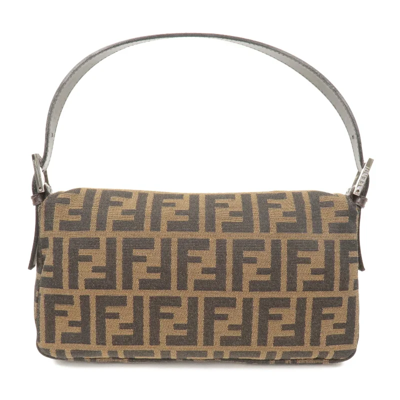 Fendi By The Way bags with a printed map pattern for a travel - inspired lookFENDI Mamma Baguette Zucca Canvas Leather Shoulder Bag Brown 26424