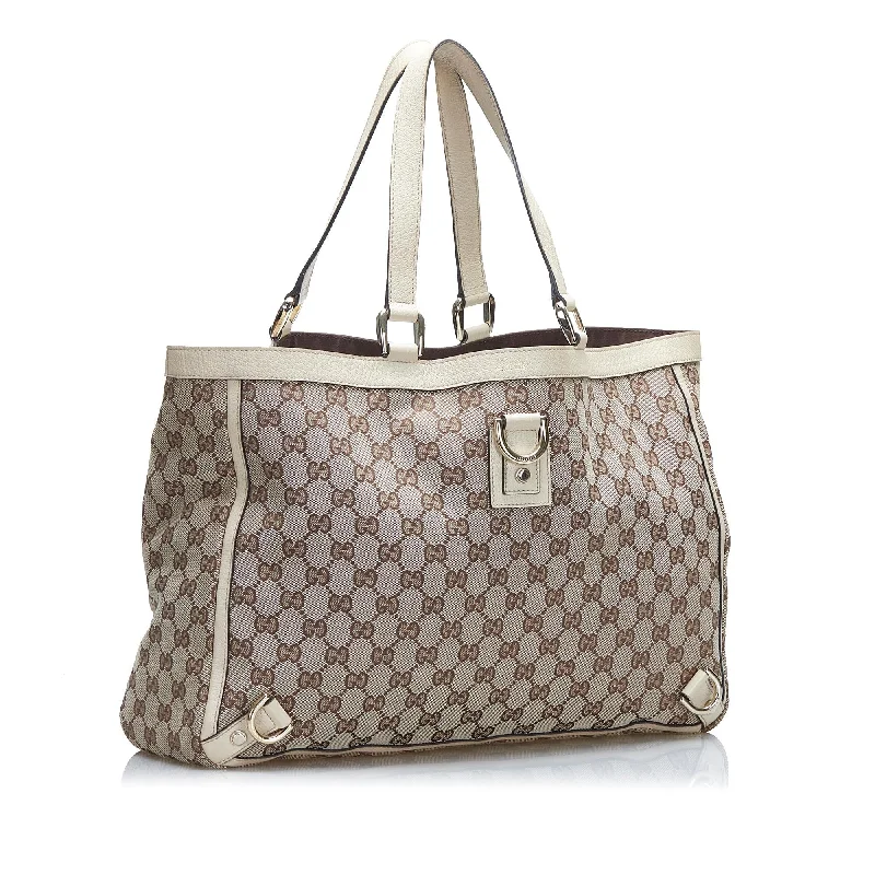 Women Gucci bags with a magnetic snap closure for easy accessGucci GG Canvas Abbey D-Ring Tote (SHG-sXPckG)