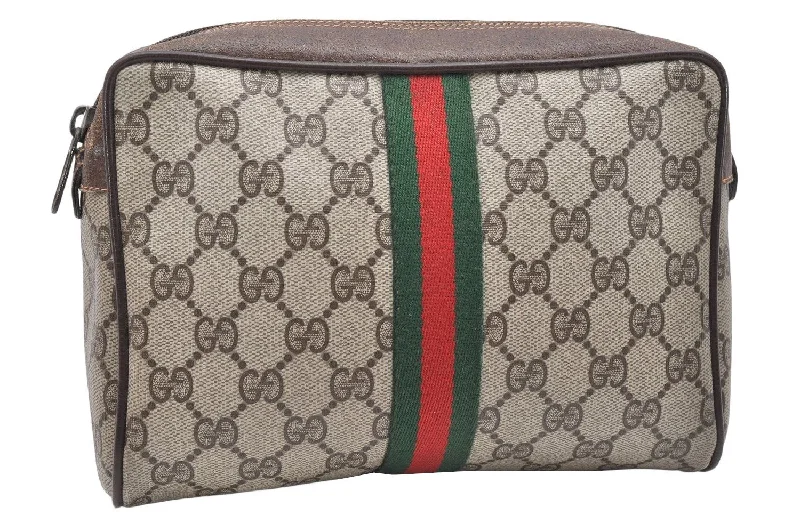 Women Gucci Sylvie bags featuring the signature web stripeAuthentic GUCCI Web Sherry Line Clutch Hand Bag Purse GG PVC Leather Brown 4768K