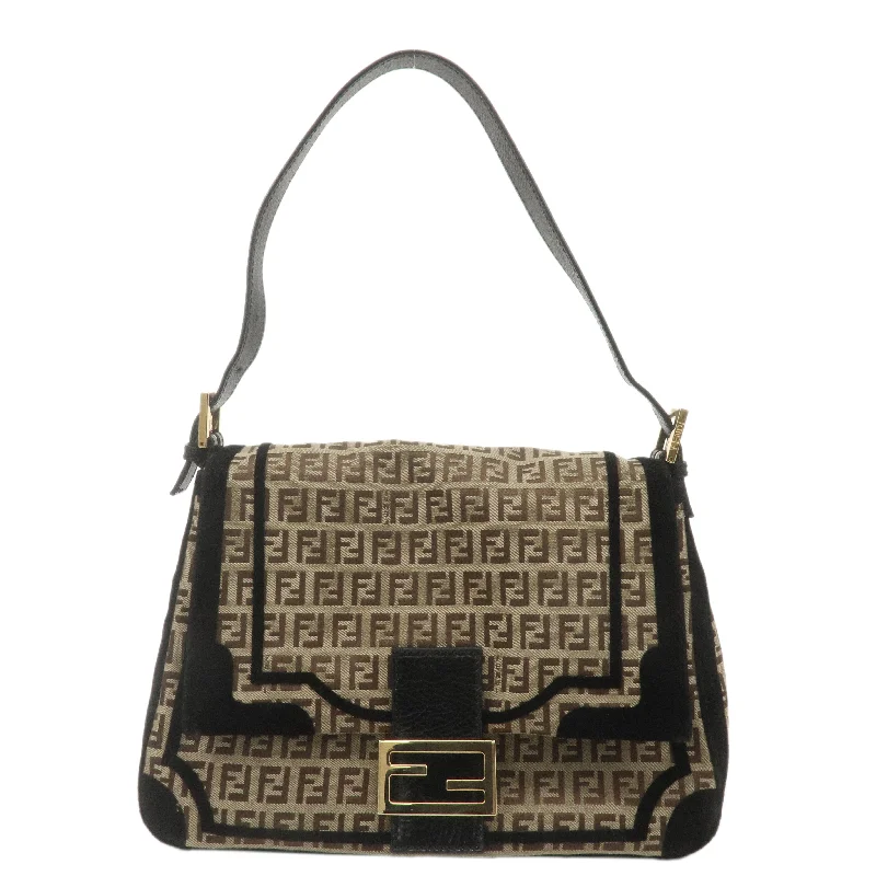 Fendi Baguette bags with a monogram - embossed leather surface for a luxurious feelFENDI Mamma Baguette Zucchino Canvas Leather Velour Bag 8BR001