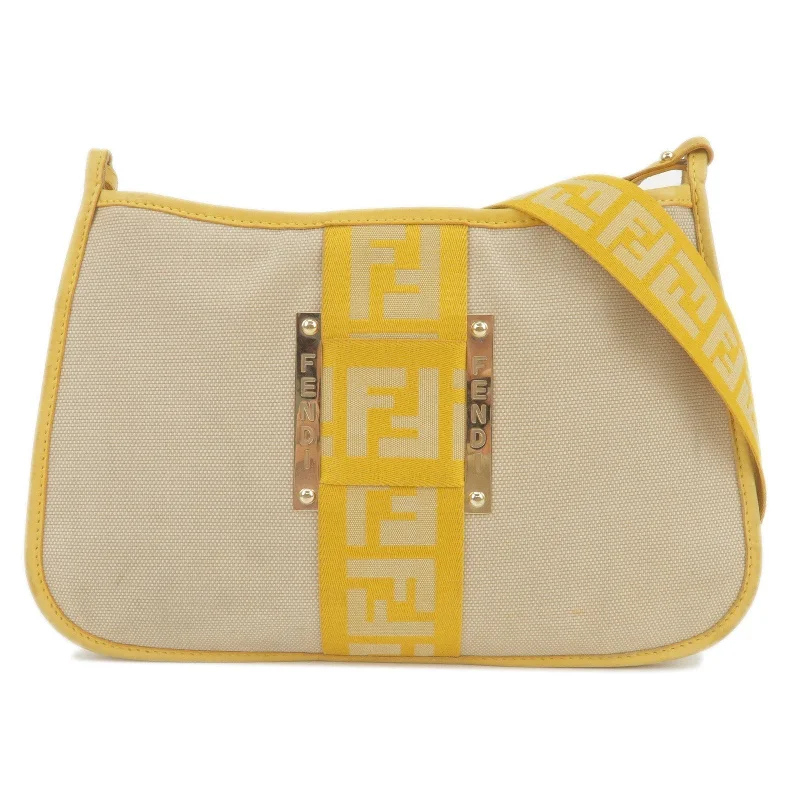 Fendi backpacks with a sleek, modern design and a matte finishFENDI Logo Canvas Leather Shoulder Bag Beige Yellow 8BT084