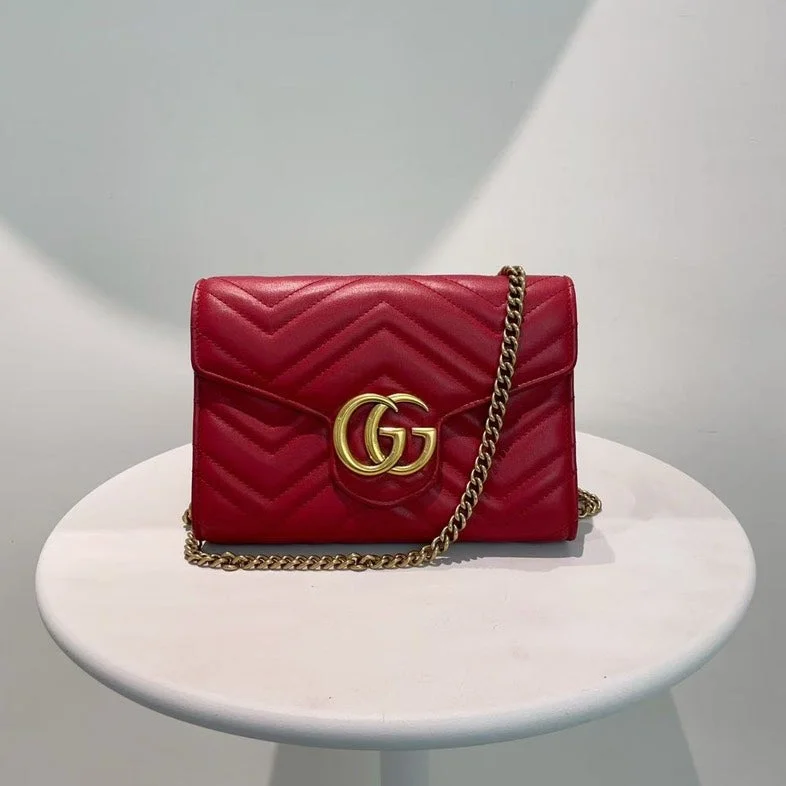 Women Gucci bags with a chain - link trim and a leather bodyGucci Marmont Red Leather Wallet On Chain Small