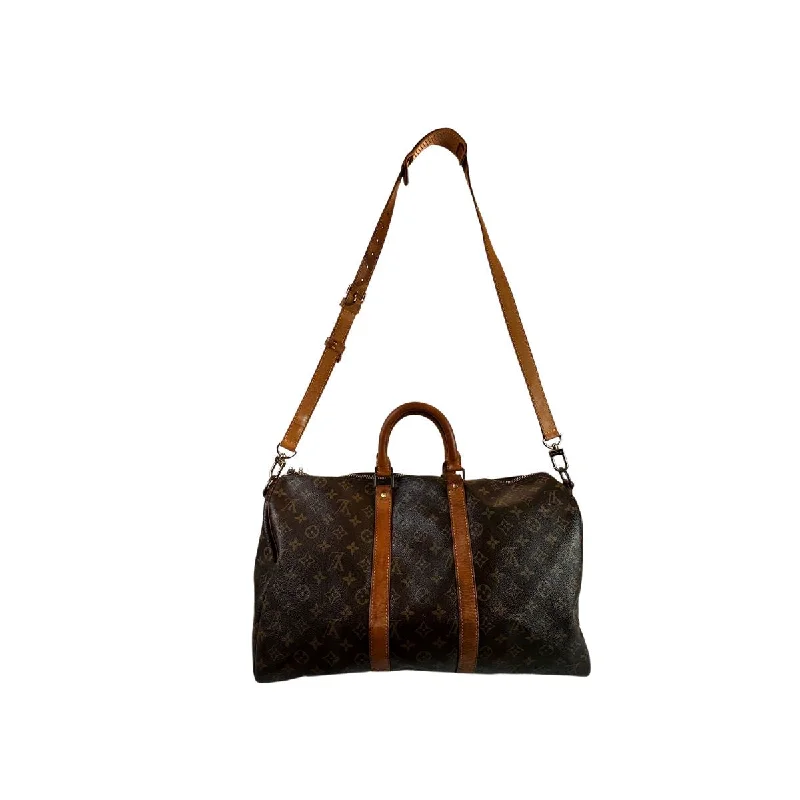 Ladies Louis Vuitton Capucines bags with gold - toned hardwareLouis Vuitton Keepall 45 with Bandoulière Strap Monogram Canvas