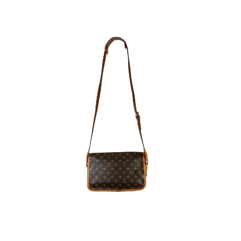 Louis Vuitton Twist bags with a crystal - embellished LV - turnlockLouis Vuitton Gibecière